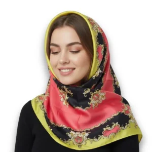 Çiçek Desenli Sarı Renk Saten Eşarp, mankende başörtüsü tarzında önden poz, beyaz fon.