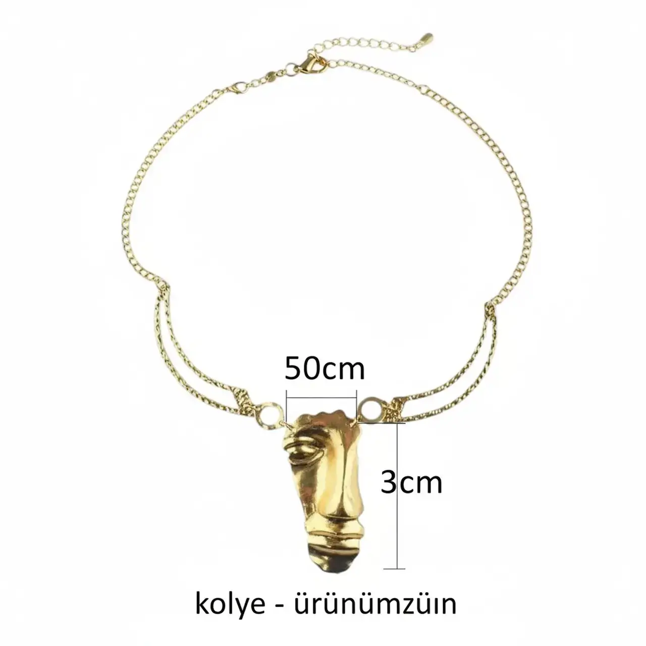 Beyaz arka planda altın kaplama yüz figürlü kabartma kolyenin boyut bilgilerini gösteren ölçü şeması.